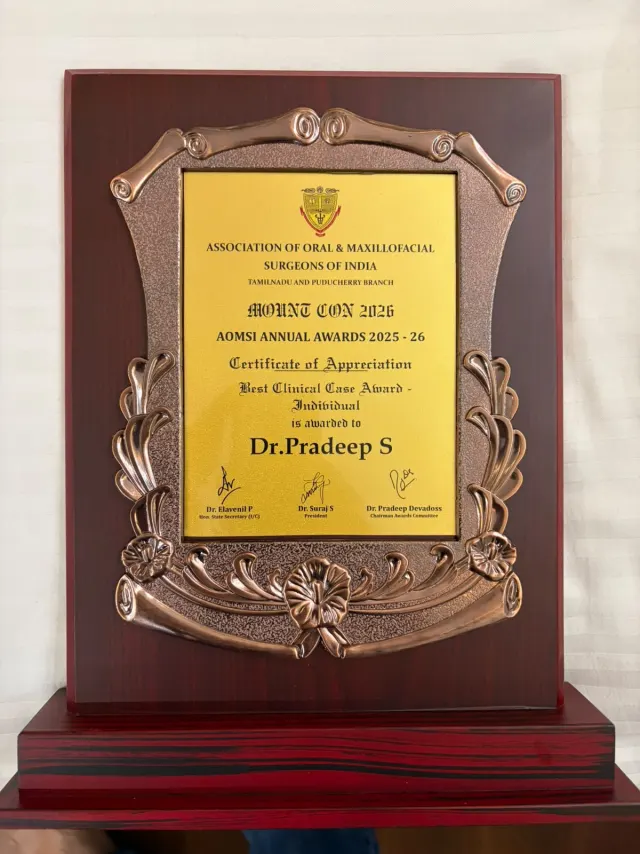 MOUNTCON 2026 award plaque presented to Dr. Pradeep S. for the Best Clinical Case Award – Individual, AOMSI Annual Awards 2025–26